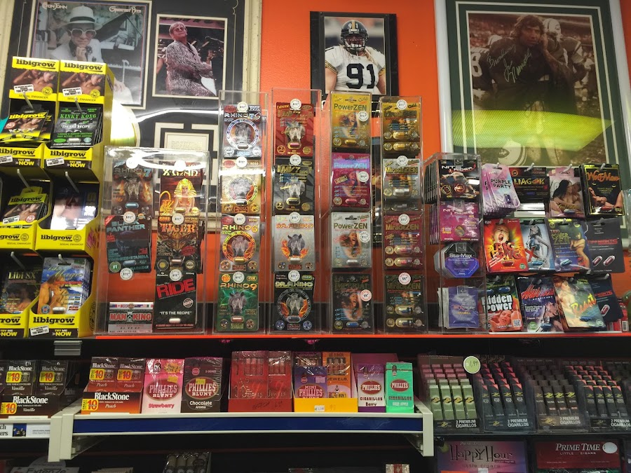 Wall of cigarillos and specialty products at Discount Cigarettes +
